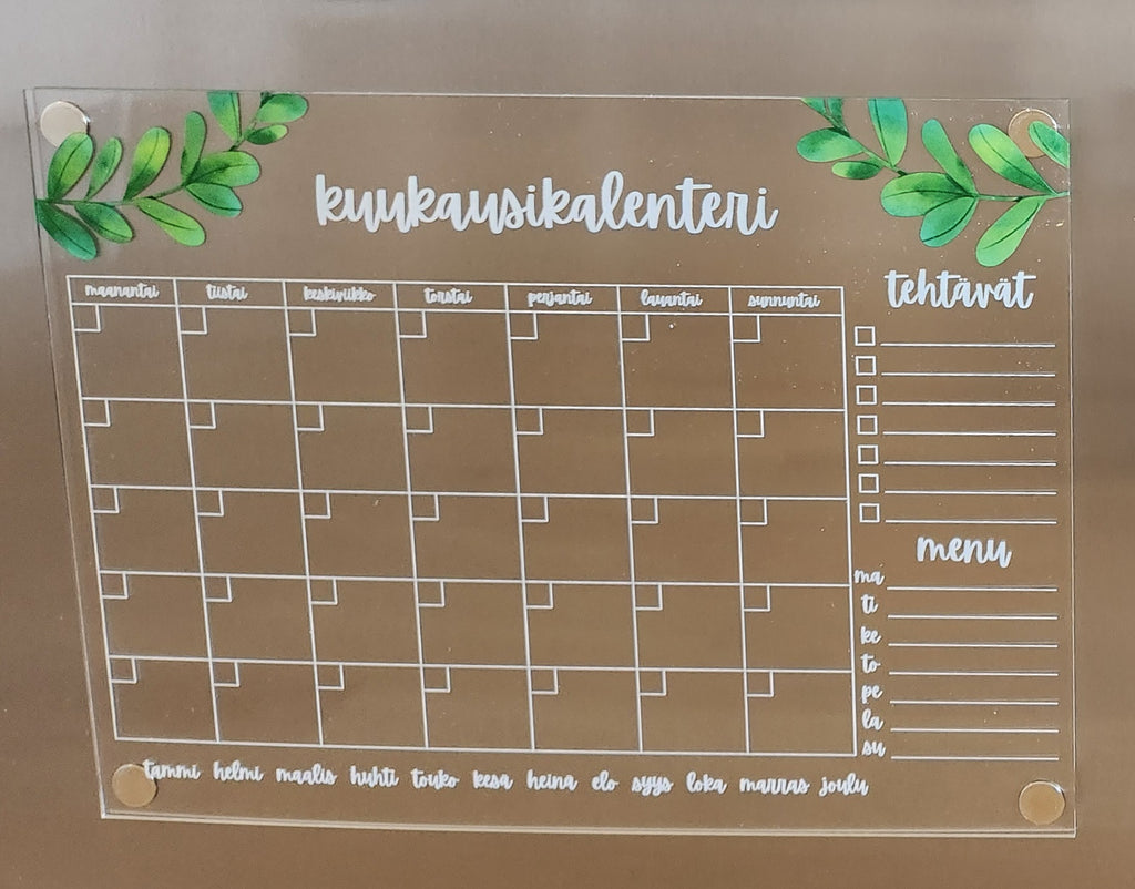 Kuukausikalenteri jääkaapin oveen