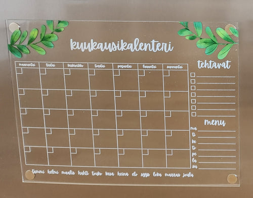 Kuukausikalenteri jääkaapin oveen