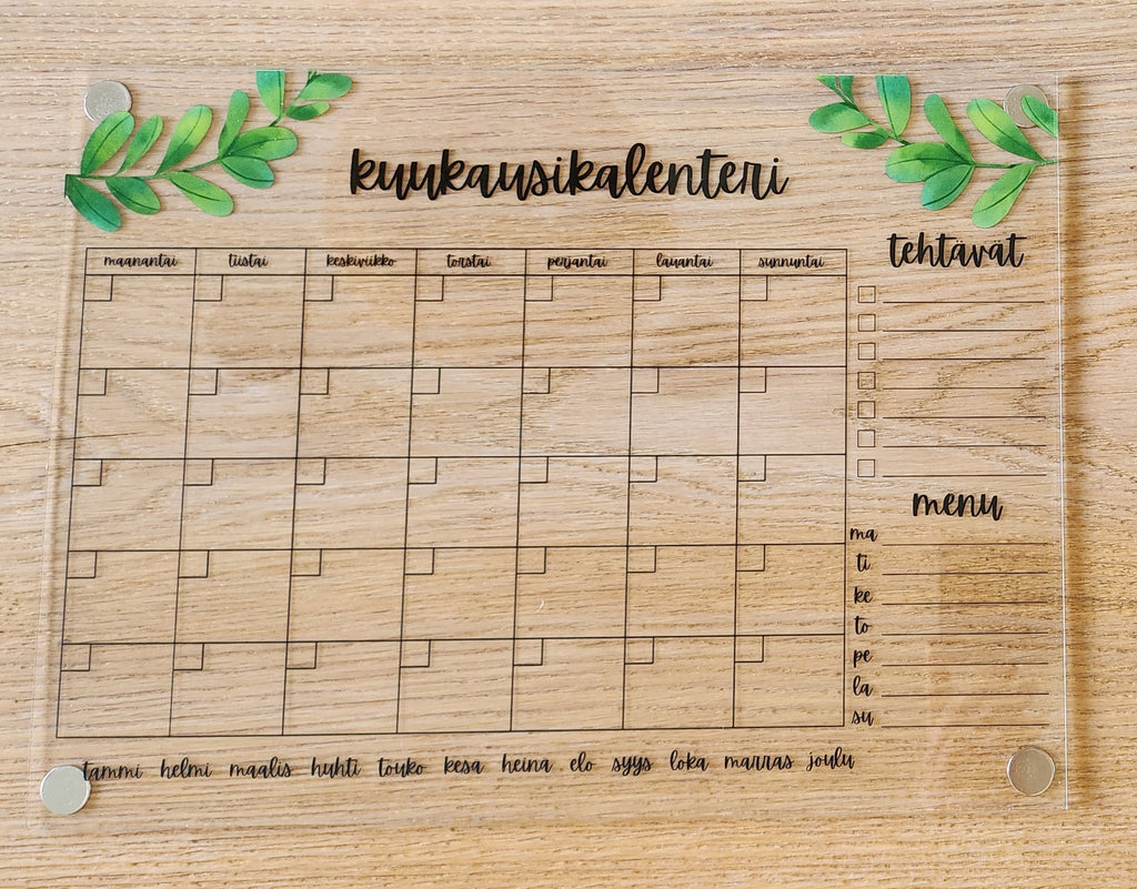 Kuukausikalenteri jääkaapin oveen