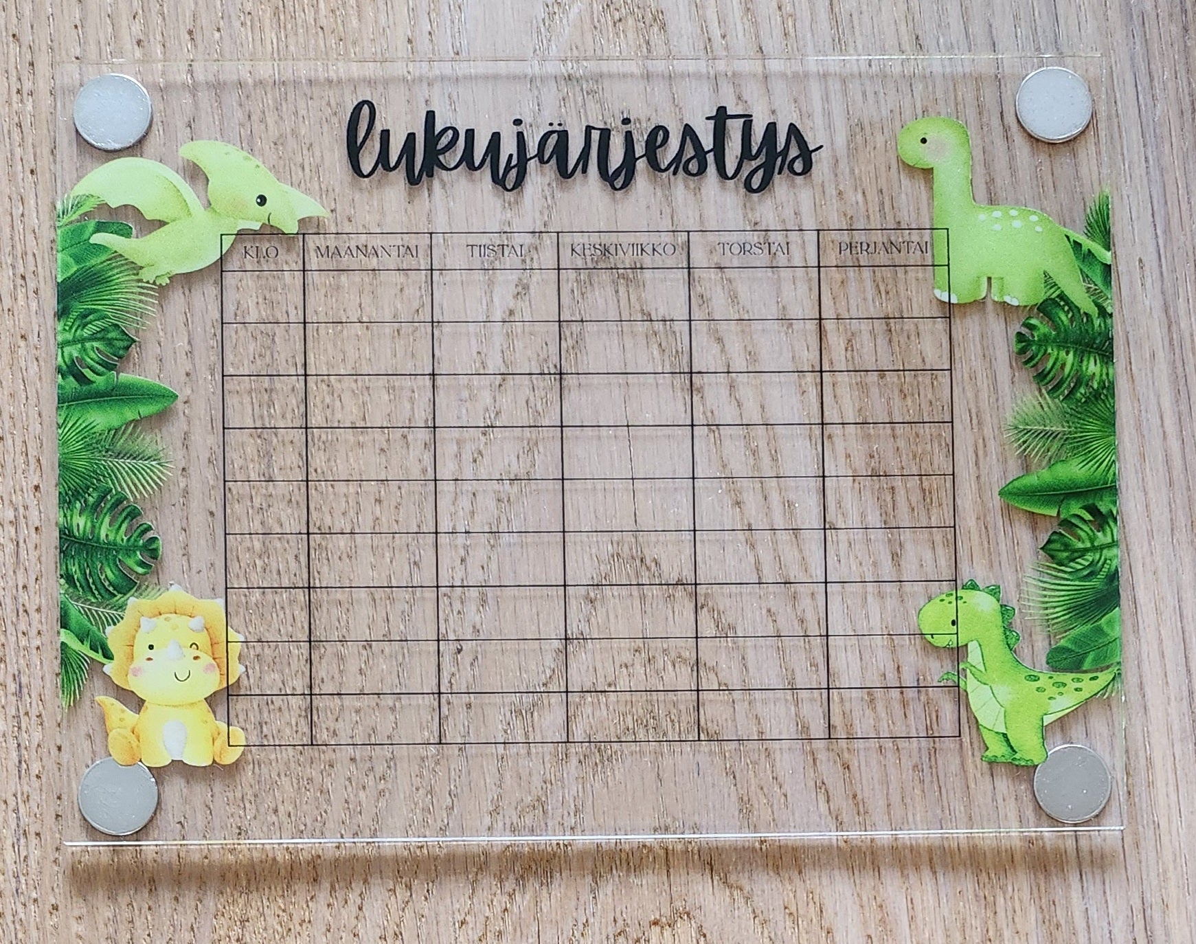 Lukujärjestys (dinosaurukset) jääkaapin oveen